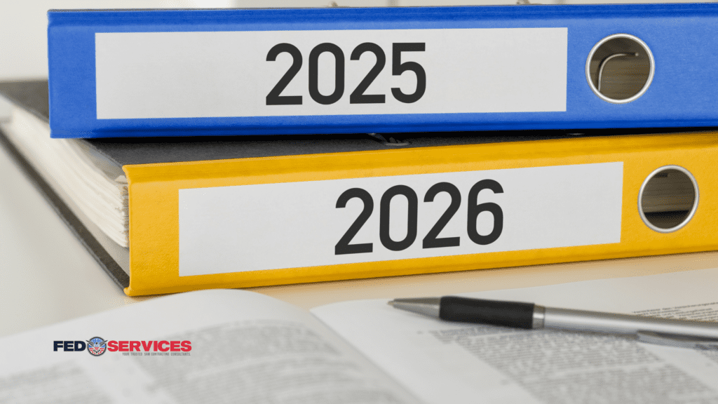 Folders labeled 2025 and 2026 representing year-end review and planning for small businesses in federal contracting.